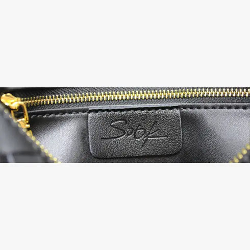 Beuteltasche aus echtem Leder im gewebten Stil