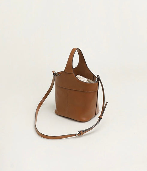 <tc>Elle - Borsa a secchiello fatta a mano in stile minimalista</tc>