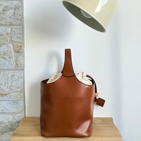 <tc>Elle - Borsa a secchiello fatta a mano in stile minimalista</tc>