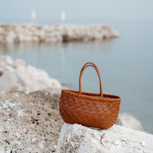 <tc>Suri - Borsa a tracolla tote intrecciata a mano a spina di pesce</tc>