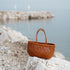 <tc>Suri - Borsa a tracolla tote intrecciata a mano a spina di pesce</tc>