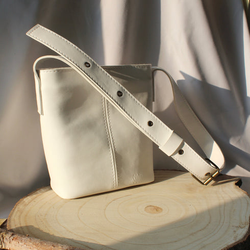 <tc>Borsa a secchiello in pelle vegana di mais caramello bianca</tc>