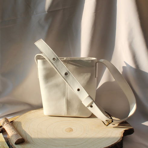 <tc>Borsa a secchiello in pelle vegana di mais caramello bianca</tc>